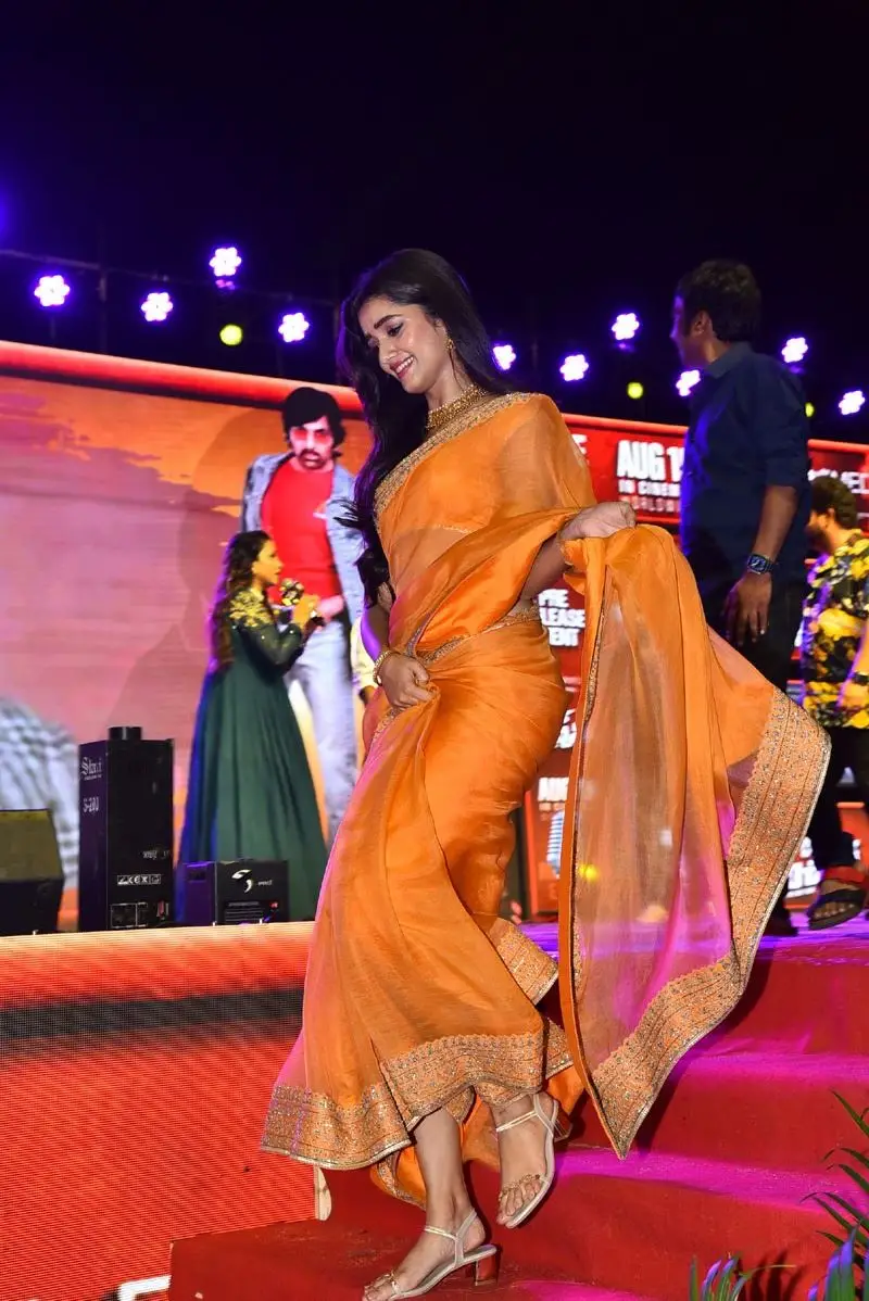 Bhagyashri Borse in orange saree sleeveless blouse